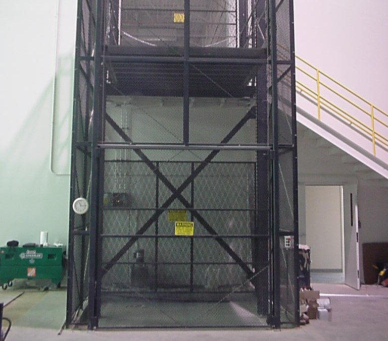 Vertical reciprocating conveyor